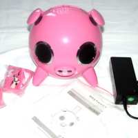 Докинг станция с високоговорители за iPod във формата ... на прасе