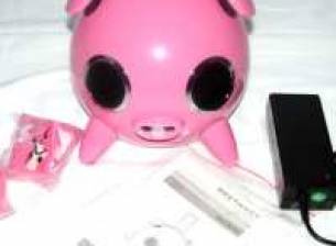 Докинг станция с високоговорители за iPod във формата ... на прасе