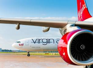 Причинен от външна батерия пожар приземи полет на Virgin Atlantic