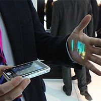 Apple и Nokia гледат към телефоните с проектори